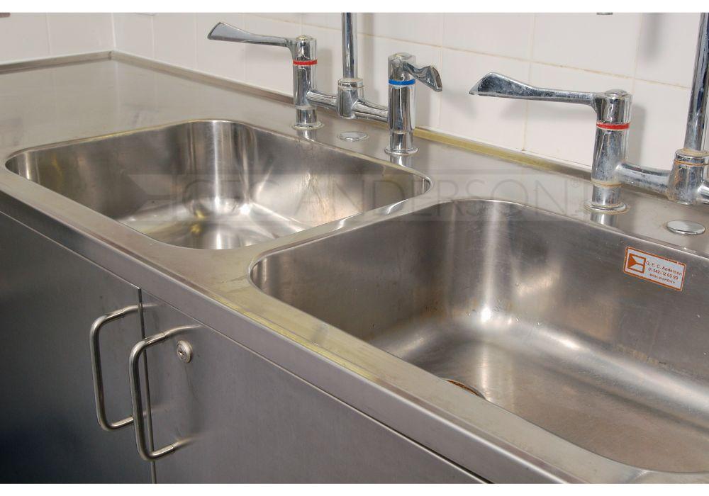 Integrated sinks within stainless steel worktop