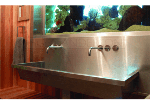 Bespke stainless steel wash trough with fishtank splashback