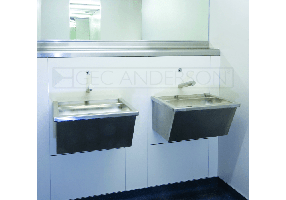 Fully shrouded stainless steel wash troughs