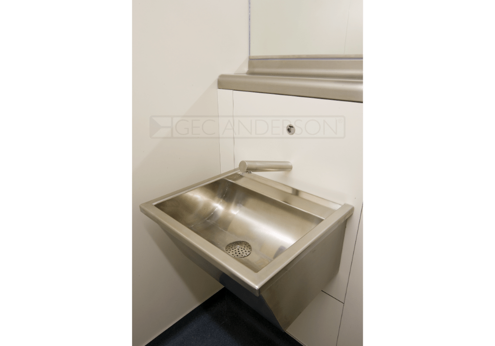 Fully shrouded stainless steel wash trough