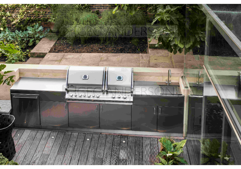 Stainless steel outside worktop and cabinets with lowered area for BBQ unit