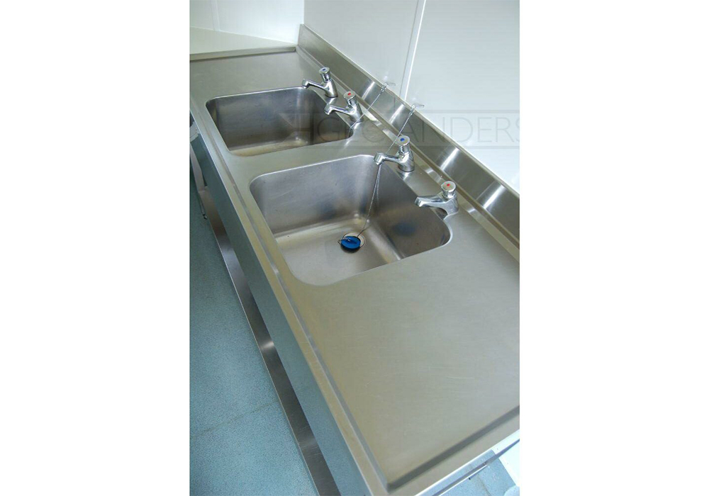 Decimetric® sinktop with integral sinks and back upstand. Lipped front and side edges.