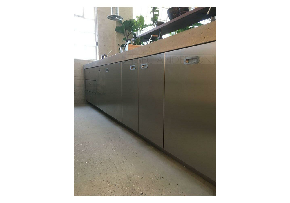 Stainless steel base cabinets wtih concrete worktop.